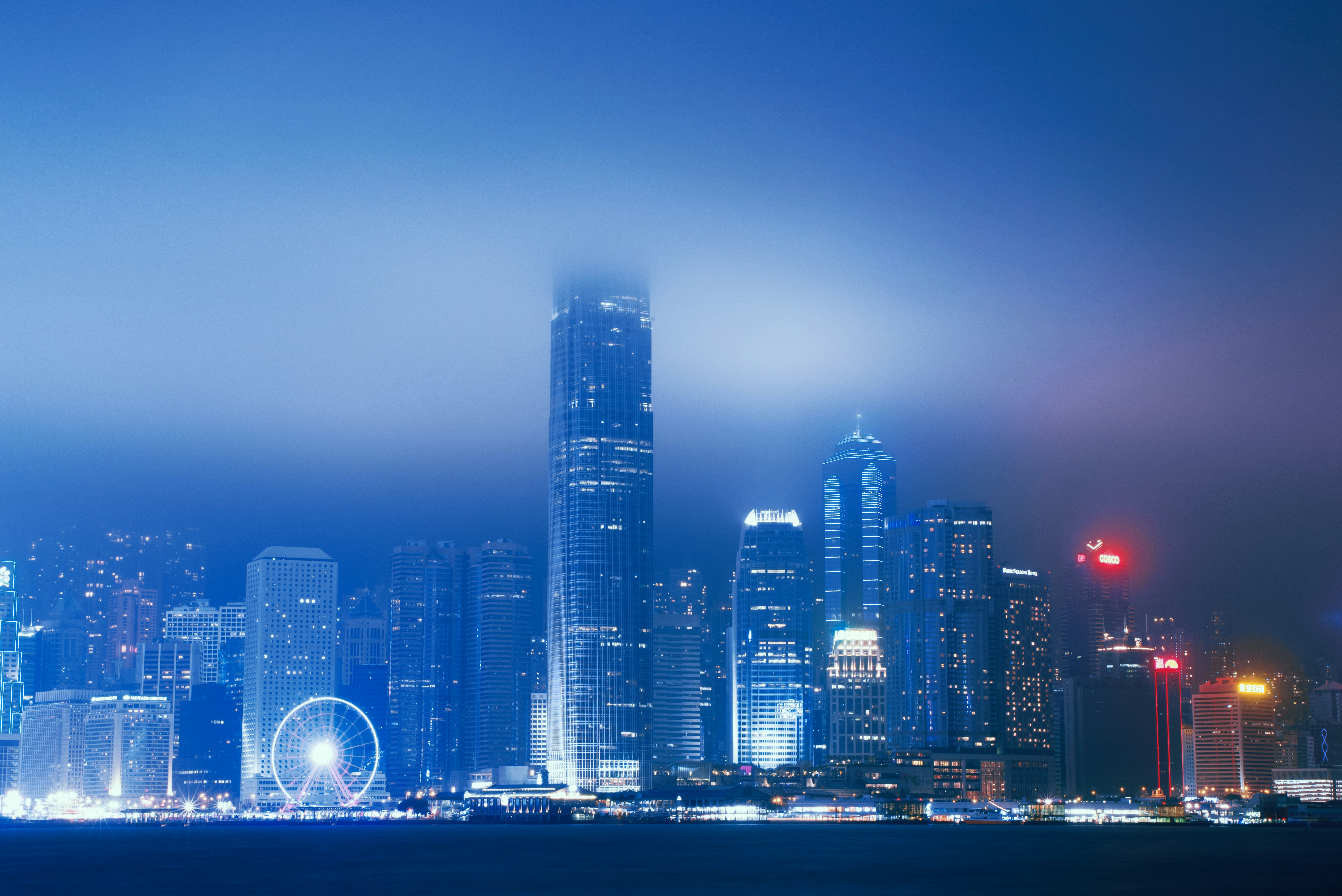 city skyline during night time